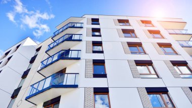 New modern block of flat, condo architecture. Residential apartment flat, luxury house complex. City real estate property.