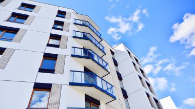 New modern block of flat, condo architecture. Residential apartment flat, luxury house complex. City real estate property.