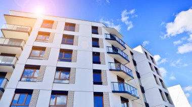 New modern block of flat, condo architecture. Residential apartment flat, luxury house complex. City real estate property.