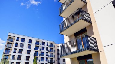 New modern block of flat, condo architecture. Residential apartment flat, luxury house complex. City real estate property.