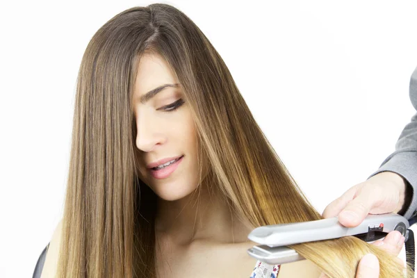 Gorgeous girl having long hair straightened isolated closeup — Stock Photo, Image