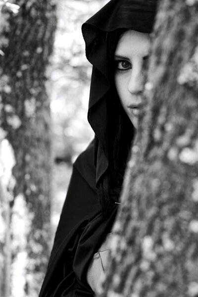 Woman with hood hiding