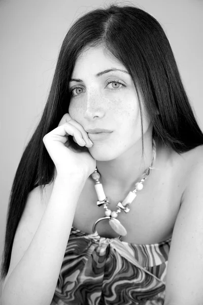 Young woman with long hair bored and sad — Stock Photo, Image