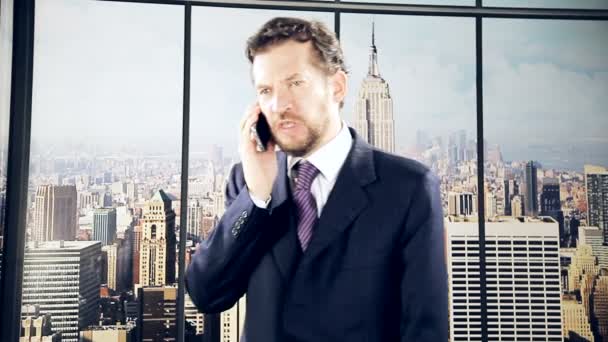 Serious business man on the phone — Stock Video