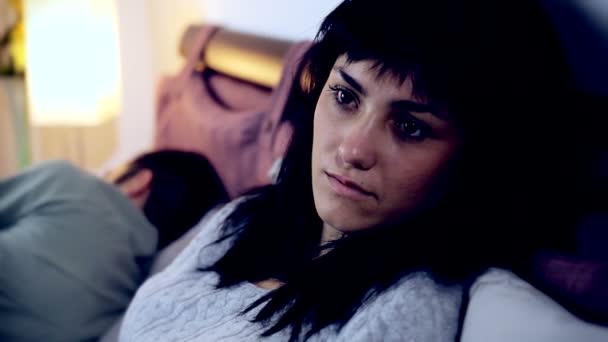 Triste femme au lit 