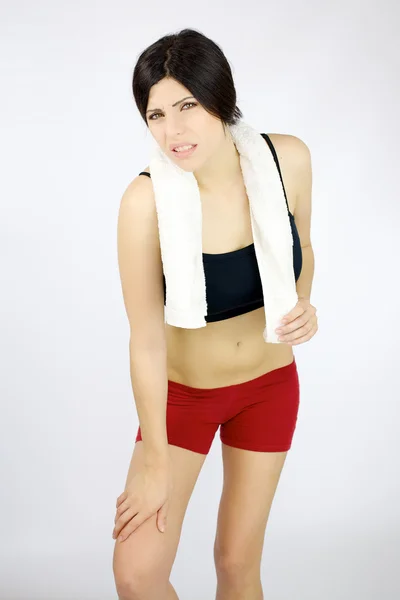 Sport woman with muscle problem — Stock Photo, Image