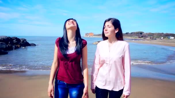 Beautiful girls walking and gossiping — Stock Video