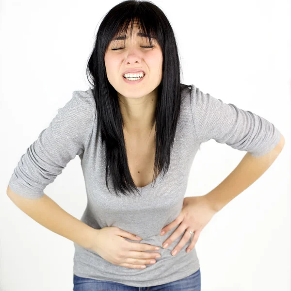 Mujer con fuerte dolor menstrual — Foto de Stock