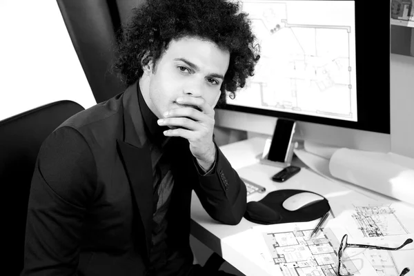 Handsome modern architect thinking in office — Stock Photo, Image