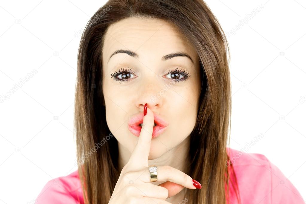 Woman with big lips making silence sign