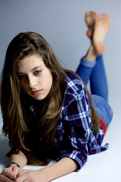 Sad teenager looking away feeling strong emotion wide Royalty Free Stock Images