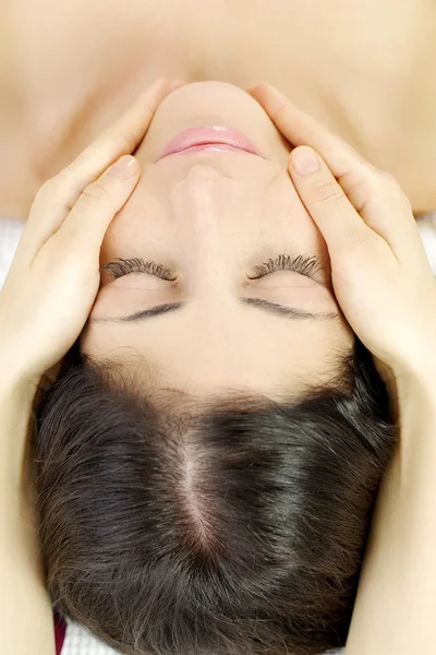 Getting relaxing massage in spa — Stock Photo, Image