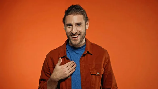 Positive Young Man Smiling Looking Camera Orange — Stock Photo, Image