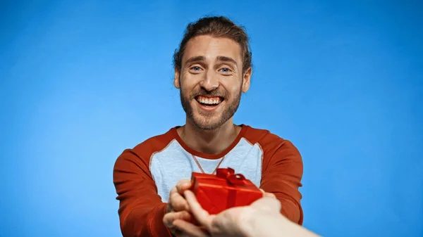 Cheerful Man Giving Present Woman Blue — Stock Photo, Image