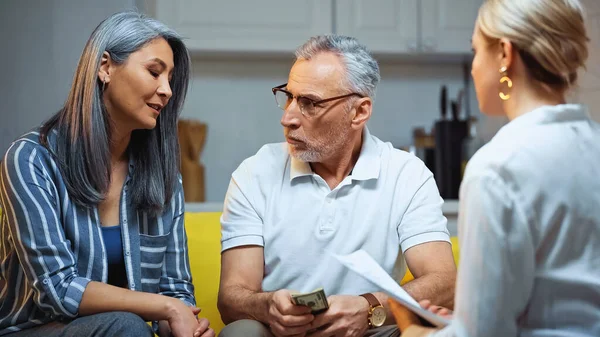 Senior Multicultural Couple Talking Insurance Broker Blurred Foreground — Stock Photo, Image