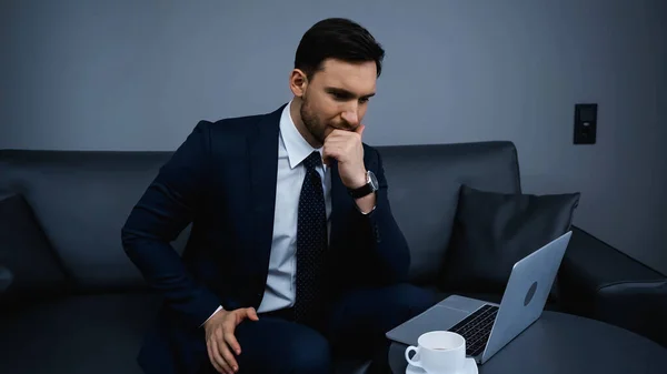 Pensive Businessman Sitting Laptop Coffee Cup Hotel — Stock Photo, Image