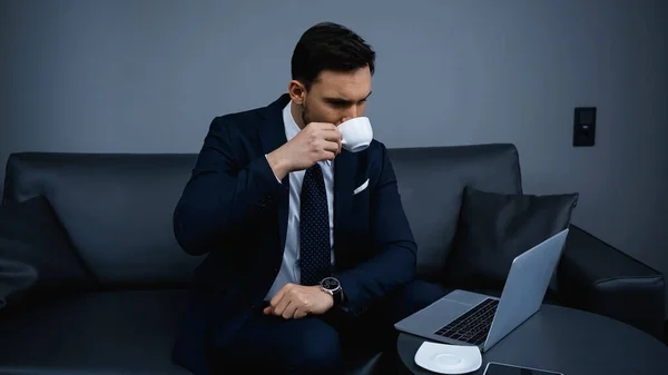 Businessman Drinking Coffee Laptop Smartphone Hotel Room — Stock Photo, Image