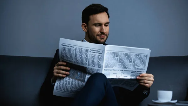 Businessman Reading Newspaper Cup Coffee Blurred Foreground — Stock Photo, Image