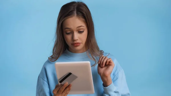 Teenage Girl Sweatshirt Holding Credit Card Digital Tablet Isolated Blue — Stock Photo, Image