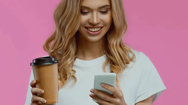 Cheerful Woman Using Smartphone Holding Coffee Isolated Pink — Stock Photo, Image