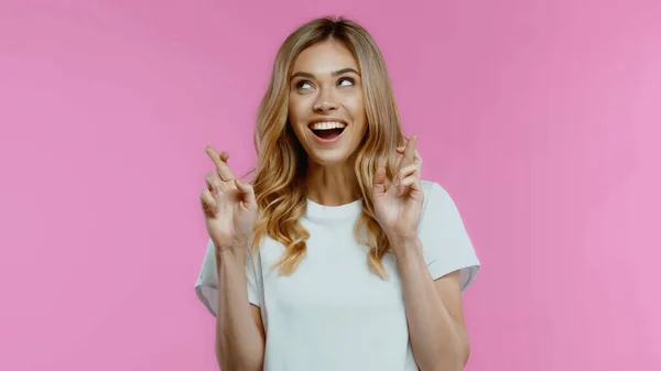 Blonde Woman Crossed Fingers Looking Away Isolated Pink — Stock Photo, Image