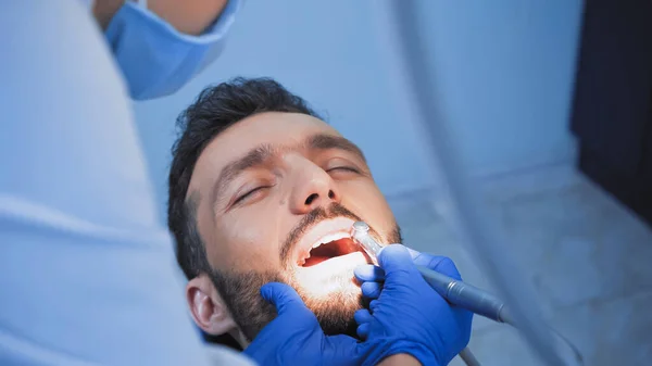 Dentist Medical Mask Curing Teeth Patient Dental Drill Blurred Foreground — Stock Photo, Image