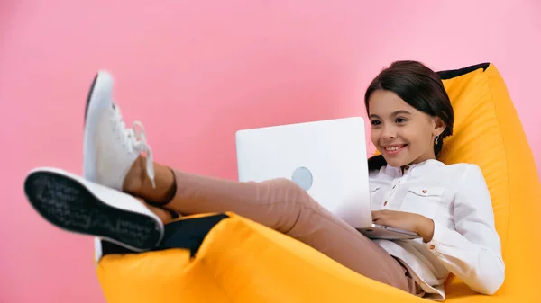 Smiling Child Using Laptop While Resting Bean Bag Chair Isolated — Stock Photo, Image