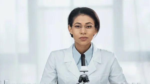 African American Scientist Glasses Looking Camera Microscope — Stock Photo, Image