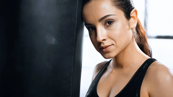 Exhausted Woman Leaning Punching Bag Gym — Stock Photo, Image