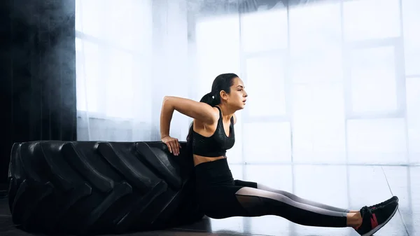 Brunette Sportive Young Woman Exercising Tire Gym — Stock Photo, Image