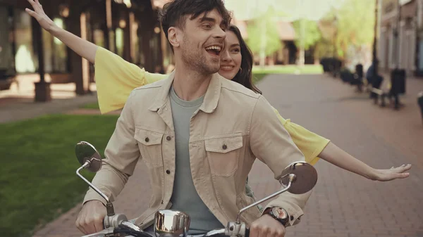 Excited Man Happy Woman Outstretched Hands Riding Motorcycle Street — Stock Photo, Image