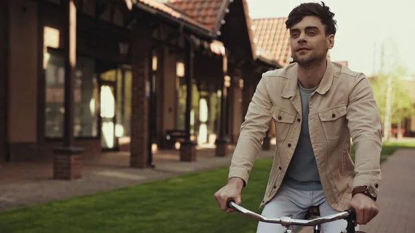 Pleased Man Riding Bicycle Buildings — Stock Photo, Image