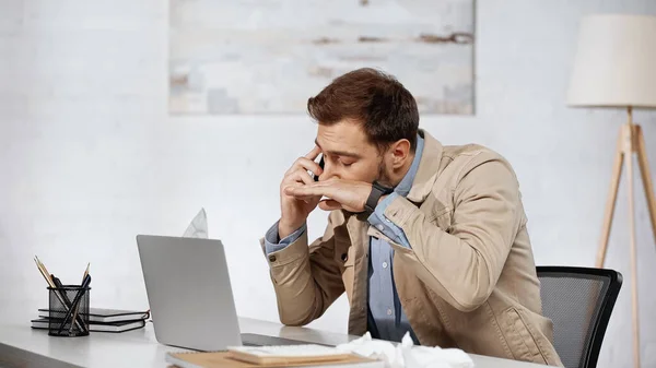 Allergic Businessman Sneezing While Talking Smartphone Laptop Desk — 图库照片