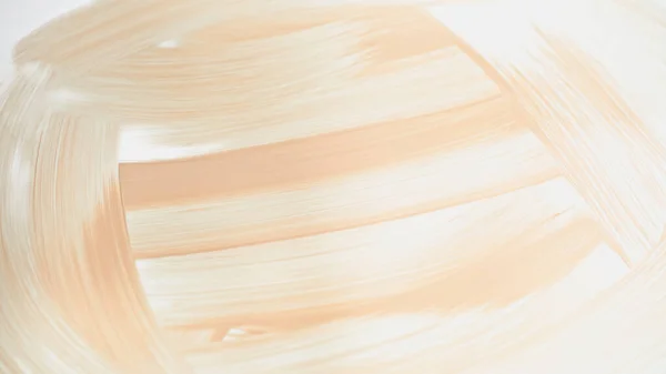 Striche beige und cremiges Make-up auf weißem Grund — Stockfoto
