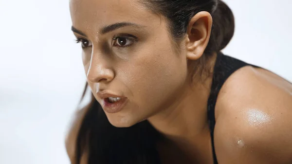 Close up of young sportswoman exercising in gym — Stock Photo