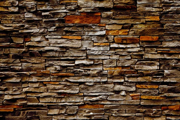 Кирпичная стена из камня — стоковое фото