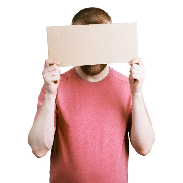 Man holding a cardboard sign — Stock Photo, Image