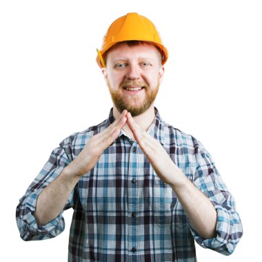 Adam ellerini katlanmış evden