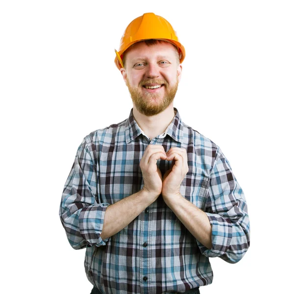 Hombre en un casco mostrando las manos corazón — Foto de Stock