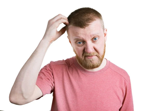 Bearded man scratches his head hair — Stock Photo, Image