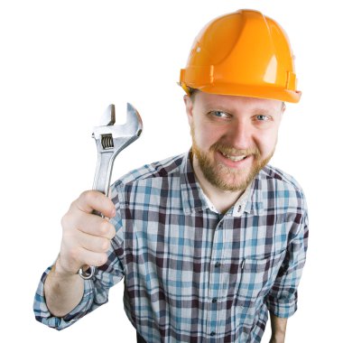 Bir İngiliz anahtarı bir kask içinde adam