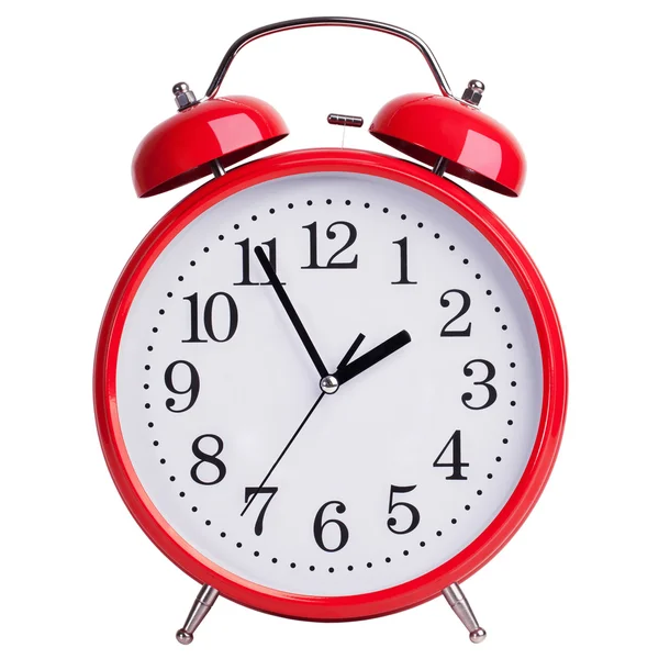 Alarm clock shows five minutes to two — Stock Photo, Image