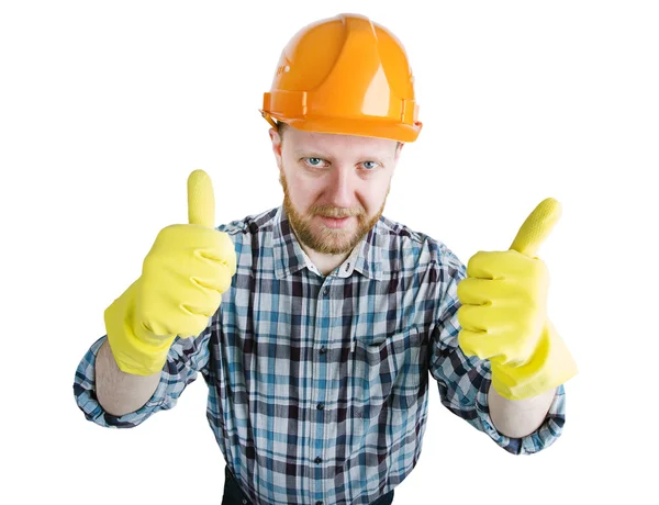 Homem em um capacete de construção laranja e luvas — Fotografia de Stock