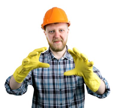 Adam bir kask ve sarı lastik tarım eldivenler