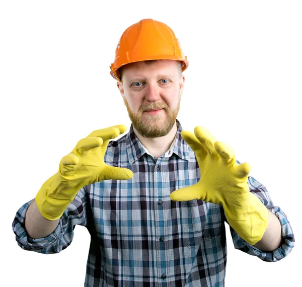 Homme au casque et gants en caoutchouc jaune — Photo