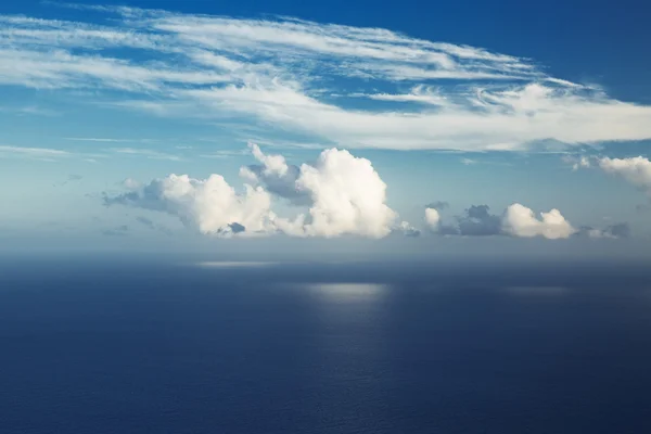 Big cloud hung over the ocean — Stock Photo, Image