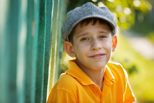 Happy boy in a gray cap — Stock Photo, Image