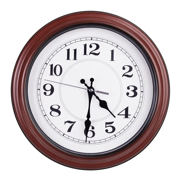 Half of the fifth on the round clock — Stock Photo, Image