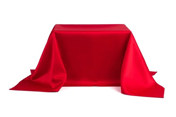 Something covered with red cloth — Stock Photo, Image