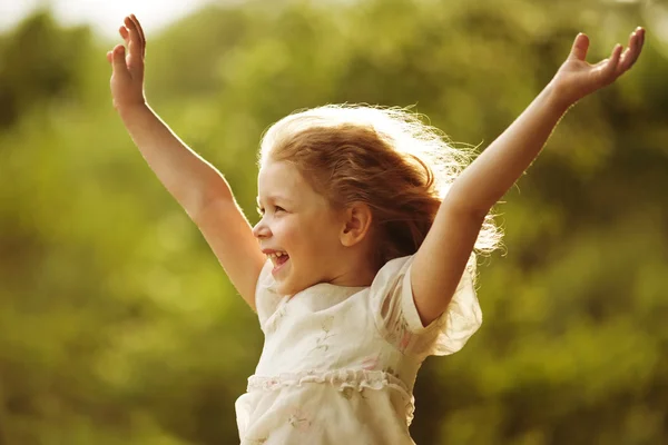 Happy and cheerful little girl — 图库照片